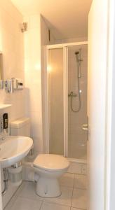 Koupelna v ubytování Hotel Rossija