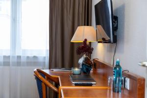 TV a/nebo společenská místnost v ubytování Hotel Rossija