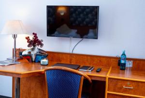 TV a/nebo společenská místnost v ubytování Hotel Rossija