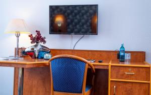 TV a/nebo společenská místnost v ubytování Hotel Rossija