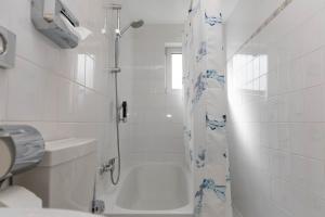 Koupelna v ubytování Hotel Rossija