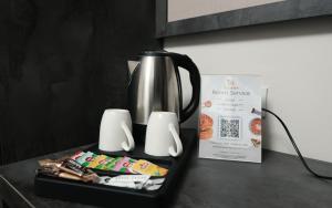 Kavos ir arbatos ruošimo rinkinys apgyvendinimo įstaigoje Lux inn