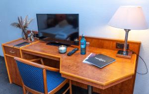 TV a/nebo společenská místnost v ubytování Hotel Rossija