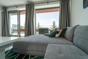 Posezení v ubytování Apartview Bukowa III by Rent like home
