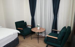 Svetainės erdvė apgyvendinimo įstaigoje Lux inn