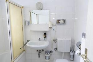 Koupelna v ubytování Hotel Rossija