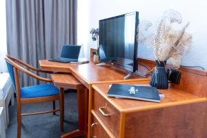 TV a/nebo společenská místnost v ubytování Hotel Rossija