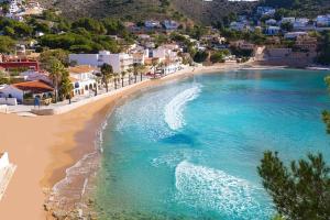 an aerial view of a beach with blue water at Casa Tere in Benitachell