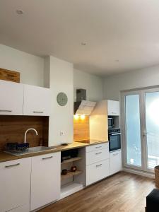 Dapur atau dapur kecil di Le Paisiblement Vôtre 3 Ch, Terrasse, Clim, Park