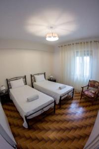 Postel nebo postele na pokoji v ubytování Didima Apartments 1
