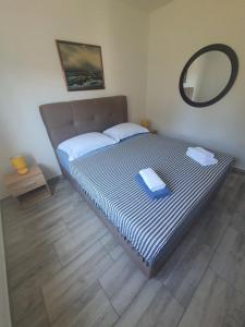 Postel nebo postele na pokoji v ubytování Apartment Marija Marina