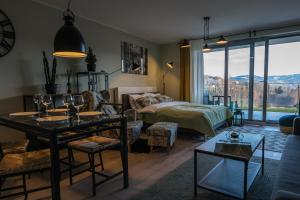 Postel nebo postele na pokoji v ubytování Apartview Bukowa III by Rent like home