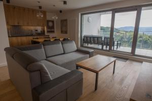 Posezení v ubytování Apartview Bukowa III by Rent like home