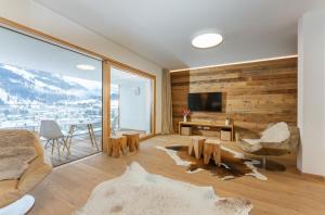 A television and/or entertainment centre at Sun Lodge Schladming by Schladming-Appartements Még 31 kép