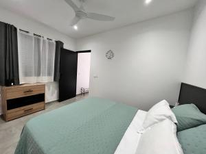 Giường trong phòng chung tại Appartement «Le Ti songe»