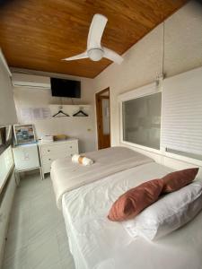 Postel nebo postele na pokoji v ubytování Hostal RENCH
