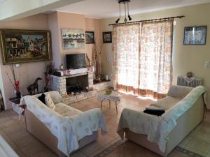 A television and/or entertainment centre at Villa Evenik