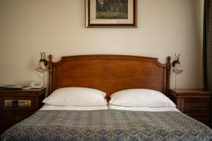 Postel nebo postele na pokoji v ubytování Hotel Belvedere Resort&SPA