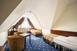 Postel nebo postele na pokoji v ubytování Hotel Belvedere Resort&SPA