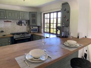 Η κουζίνα ή μικρή κουζίνα στο The White House @ Cintsa