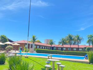 a view of a resort with a swimming pool at Pousada Mirante das Estancias in Águas de Lindóia