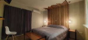 A bed or beds in a room at Departamentos Equipados Realico