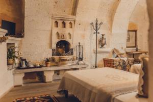 Postel nebo postele na pokoji v ubytování Kale Konak Cappadocia + 37 fotografií