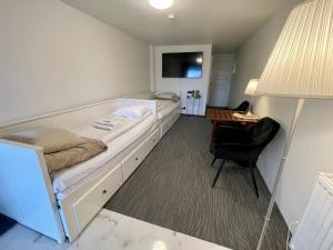 Voodi või voodid majutusasutuse Vid Gekås Ullared Boende B&B toas