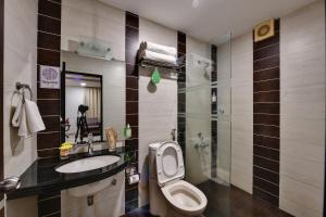 Koupelna v ubytování Click Hotel Yuvraj