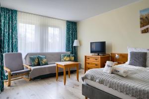 Posteľ alebo postele v izbe v ubytovaní ApartamentyPrzyMorzu Wschód Słońca Olymp z basenem
