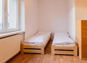 Voodi või voodid majutusasutuse Apartmány Celnice toas