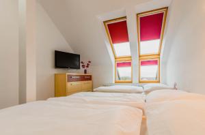 Voodi või voodid majutusasutuse Apartmány Celnice toas