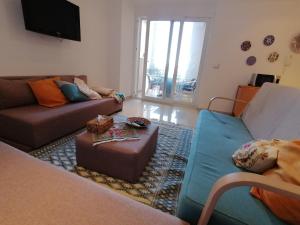 Posezení v ubytování Appartement pied dans l'eau a Tantana, Sousse