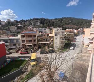 a view of a city with buildings and a street at Casa Bianca in Kavala