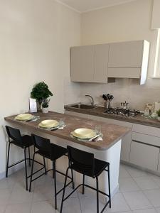 Kuchyň nebo kuchyňský kout v ubytování il Portichetto