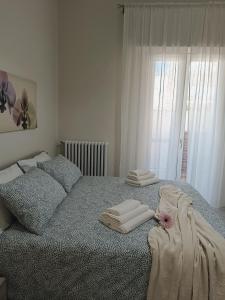 Postel nebo postele na pokoji v ubytování il Portichetto