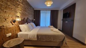 Letto o letti in una camera di Hotel Ushba in Mestia