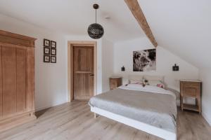 Postel nebo postele na pokoji v ubytování Villa Madona