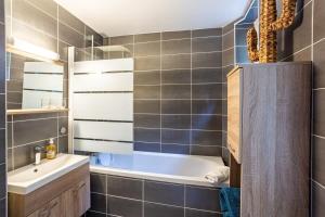 Ванная комната в Le Jacobin appartement de standing - Hyper centre
