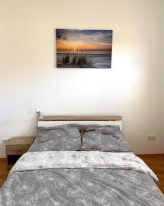 Ένα ή περισσότερα κρεβάτια σε δωμάτιο στο Vila Bösdorf Apartments