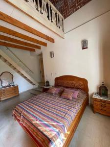 Postel nebo postele na pokoji v ubytování Dar al Murad : Une maison, un coin de paradis
