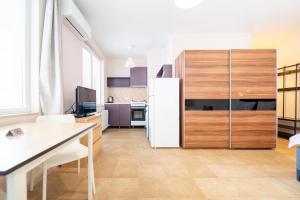 A kitchen or kitchenette at Lovely apartment in Studentski grad
