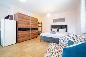 A bed or beds in a room at Lovely apartment in Studentski grad