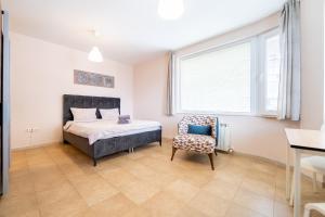 A bed or beds in a room at Lovely apartment in Studentski grad
