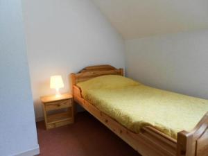 Postel nebo postele na pokoji v ubytování Résidence Pre St Jacques - Appartement 6/8 personnes au village de VIGNEC MAE-6264