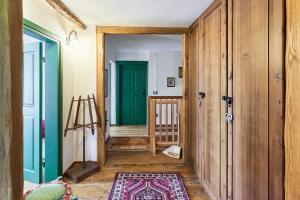 Postel nebo postele na pokoji v ubytování Conte Moro, ospitalità in Vanoi