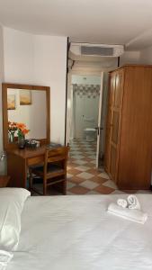 Postel nebo postele na pokoji v ubytování Hotel Montecodeno