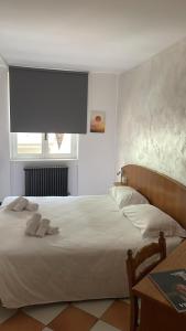Postel nebo postele na pokoji v ubytování Hotel Montecodeno