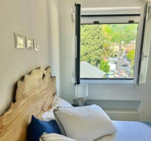 Postel nebo postele na pokoji v ubytování Vivi Portofino