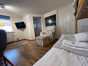 Voodi või voodid majutusasutuse Vid Gekås Ullared Boende B&B toas
